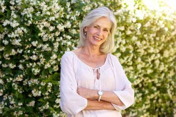 Older woman happy with urinary incontinence treatment Midhurst